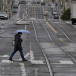 Taxes fall, wages rise and jaywalking OK'd by new state laws