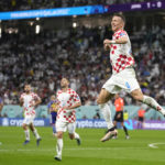 AP PHOTOS: World Cup highlights from Day 16
