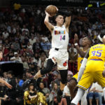 Heat get past Lakers 112-98, climb over .500 at 18-17