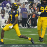 No. 3 TCU upsets No. 2 Michigan 51-45 in wild CFP semifinal
