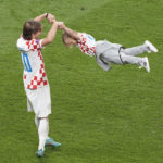 AP PHOTOS: World Cup highlights from Day 23
