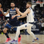 Doncic, Mavericks rebound to beat Timberwolves for split