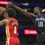 Magic beat Hawks 135-124 for 4th straight victory