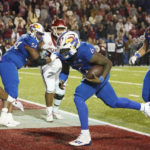 Kansas rallies, but Arkansas wins Liberty Bowl 55-53 in 3OTs