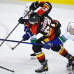 Kuzmenko scores in SO to give Canucks 4-3 win over Flames