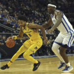 Wallace leads No. 19 Kentucky past Michigan 73-69 in London