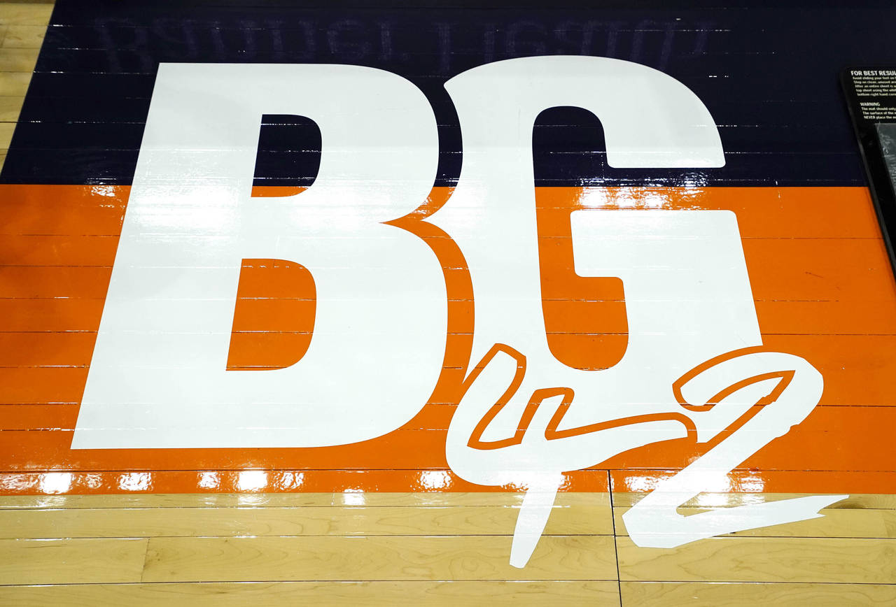 FILE - A floor decal in front of the scorer's table pays tribute to Phoenix Mercury's Brittney Grin...