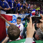 Mbappe attends to fan ahead of World Cup semifinal match