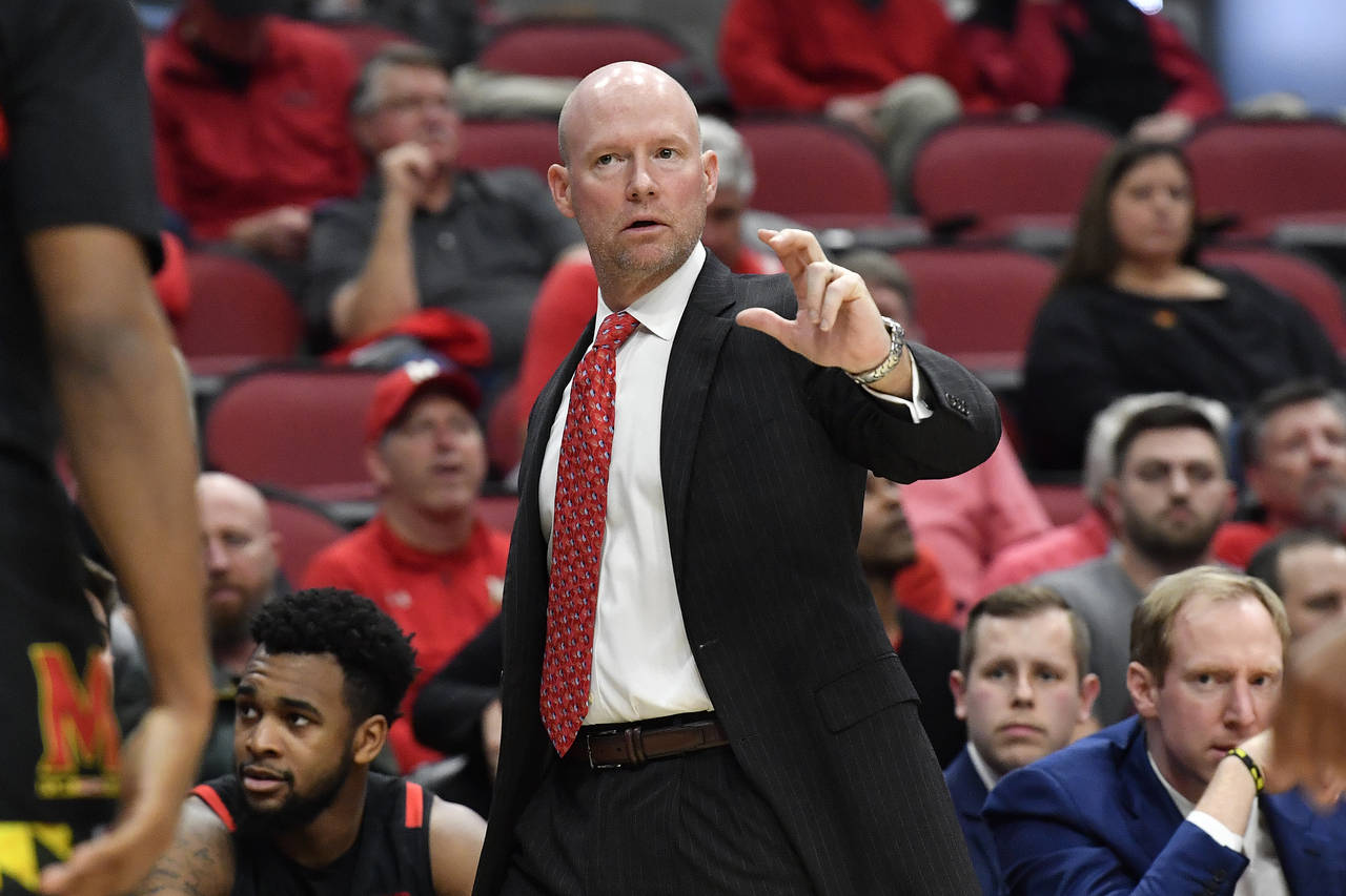 Maryland head coach Kevin Willard signals a play in to his team during the second half of an NCAA c...