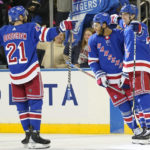 Rangers win 4-3 in OT to end Devils' 11-game road win streak