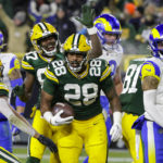 Packers defeat Rams 24-12 to keep playoff hopes alive