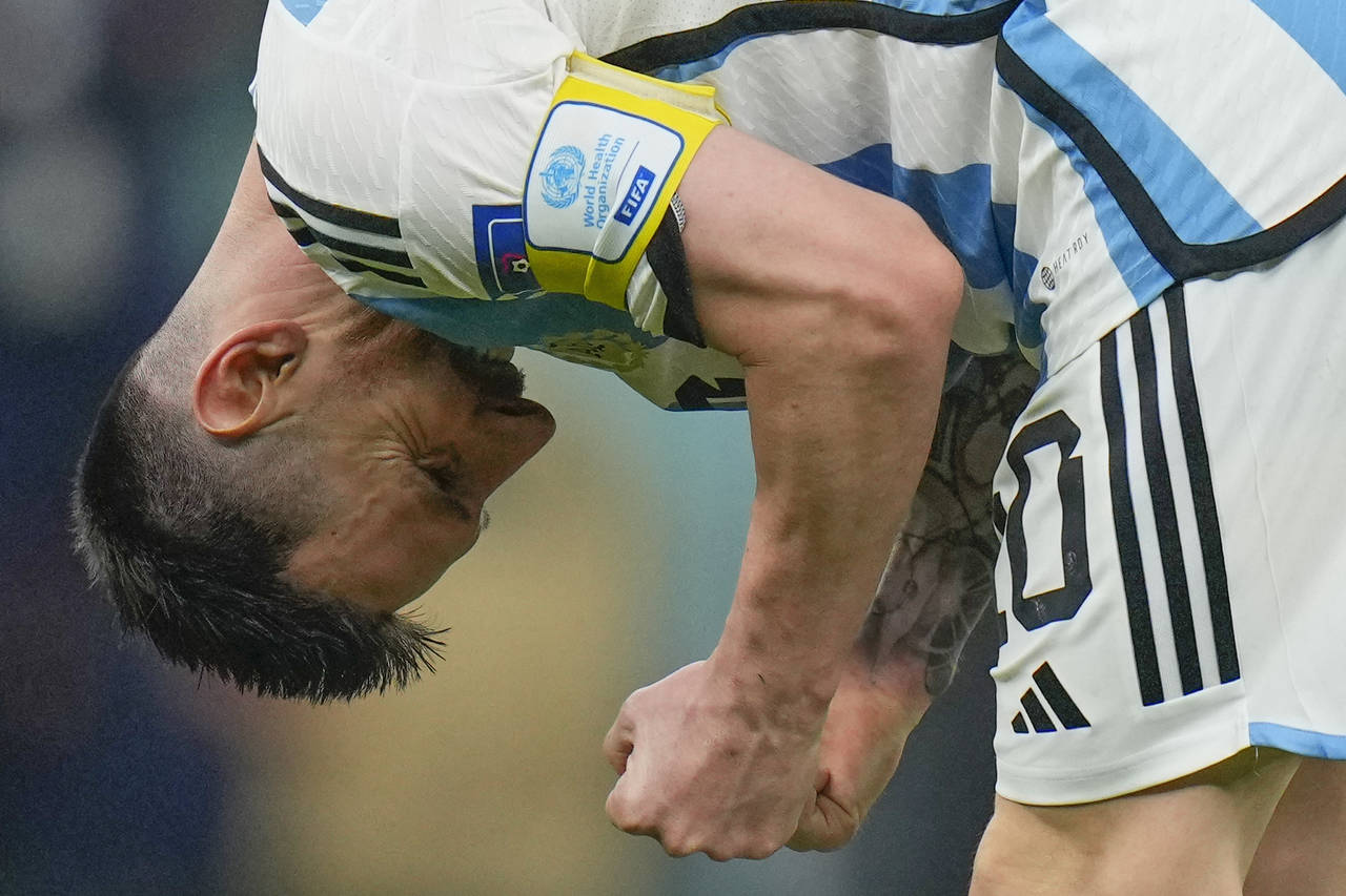 Argentina's Lionel Messi reacts following the World Cup semifinal soccer match between Argentina an...