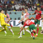 AP PHOTOS: World Cup highlights from Day 23