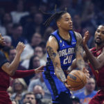 Mitchell scores 34, Cavaliers top Magic 107-96