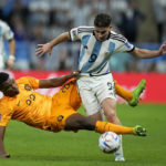 AP PHOTOS: World Cup highlights from Day 18