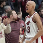 Council, Smith lead No. 9 Razorbacks past Sooners 88-78