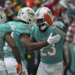 Tagovailoa throws 3 picks, Packers defeat Dolphins 26-20