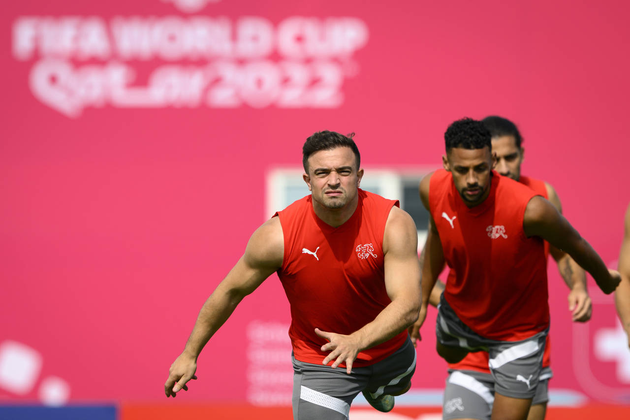 Switzerland's midfielder Xherdan Shaqiri, left, and Switzerland's midfielder Djibril Sow, right, at...