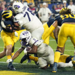 No. 3 TCU upsets No. 2 Michigan 51-45 in wild CFP semifinal