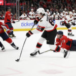 Senators come back to win in OT, end Capitals' win streak