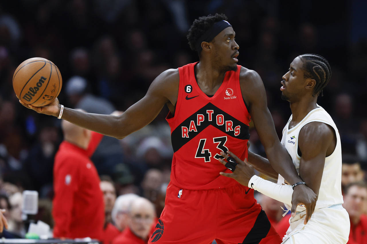 Toronto Raptors forward Pascal Siakam (43) is defended by Cleveland Cavaliers guard Caris LeVert du...