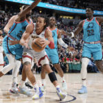 Jokic, Nuggets outlast Suns 128-125 in OT; Booker sidelined