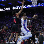 Harris, Embiid carry 76ers past Raptors 104-101 in overtime