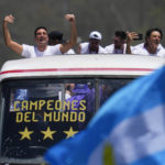 Sea of people try to catch glimpse of Argentina soccer team