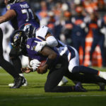 Lamar Jackson leaves game with knee injury after sack