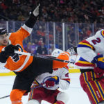 Devils top Flyers, set club mark with 11th straight road win