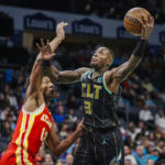 Young scores 31, Hawks hold off Ball, Hornets 125-106