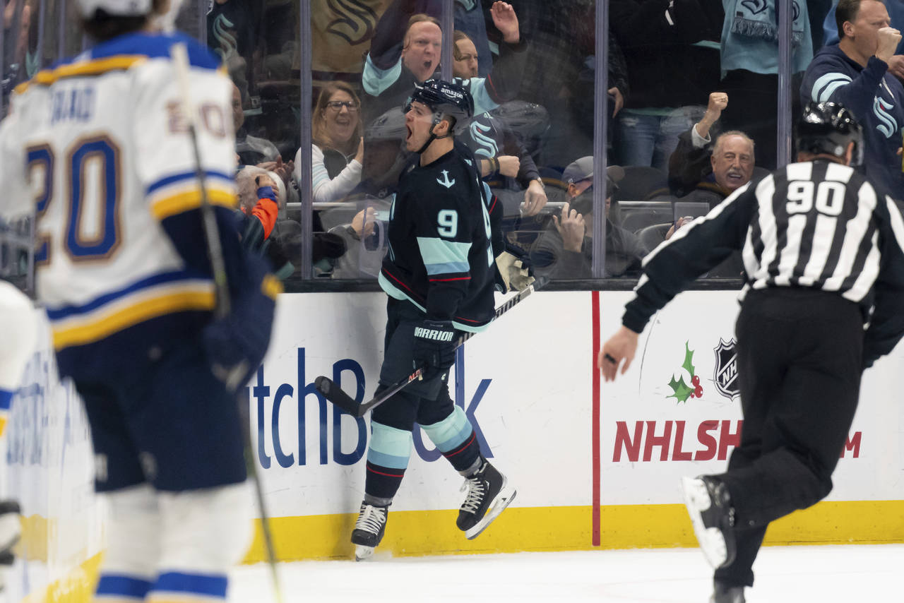 Seattle Kraken forward Ryan Donato celebrates after scoring a goal against the St. Louis Blues duri...