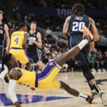 James helps Lakers stop 4-game slide with win over Magic