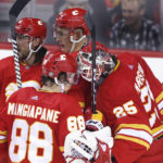 Weegar gets first goal with Flames in 3-2 win over Canucks