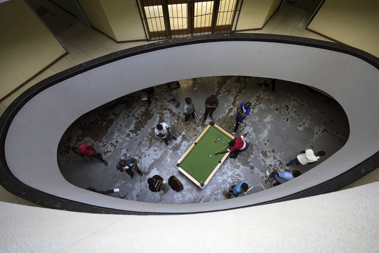 People play pool in Harare, Zimbabwe, Thursday, Nov. 24, 2022. Previously a minority and elite spor...
