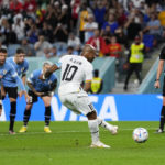 Uruguay beats Ghana 2-0 at World Cup but both teams out