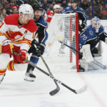 Laine scores on first shot, Blue Jackets beat Flames 3-1