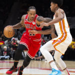 Griffin wins game at OT buzzer, Hawks hold off Bulls 123-122