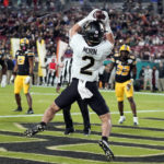 Hartman throws 3 TD passes, Wake Forest beats Missouri 27-17
