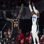 Murray hits winning free throws, Hawks end Magic's streak