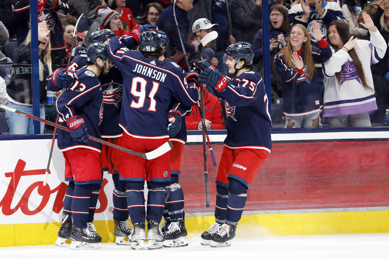 Columbus Blue Jackets players celebrate their goal against the Chicago Blackhawks during the second...