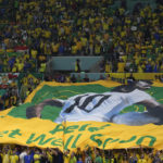Brazil fans at World Cup game remember soccer great Pelé