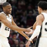 Spurs rout Rockets 124-105 with 26 from Vassell