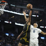 With Curry out, Poole scores 32 and Warriors beat Grizzlies