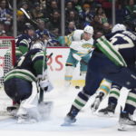 Horvat has 2 goals and 2 assists, Canucks beat Sharks 6-2