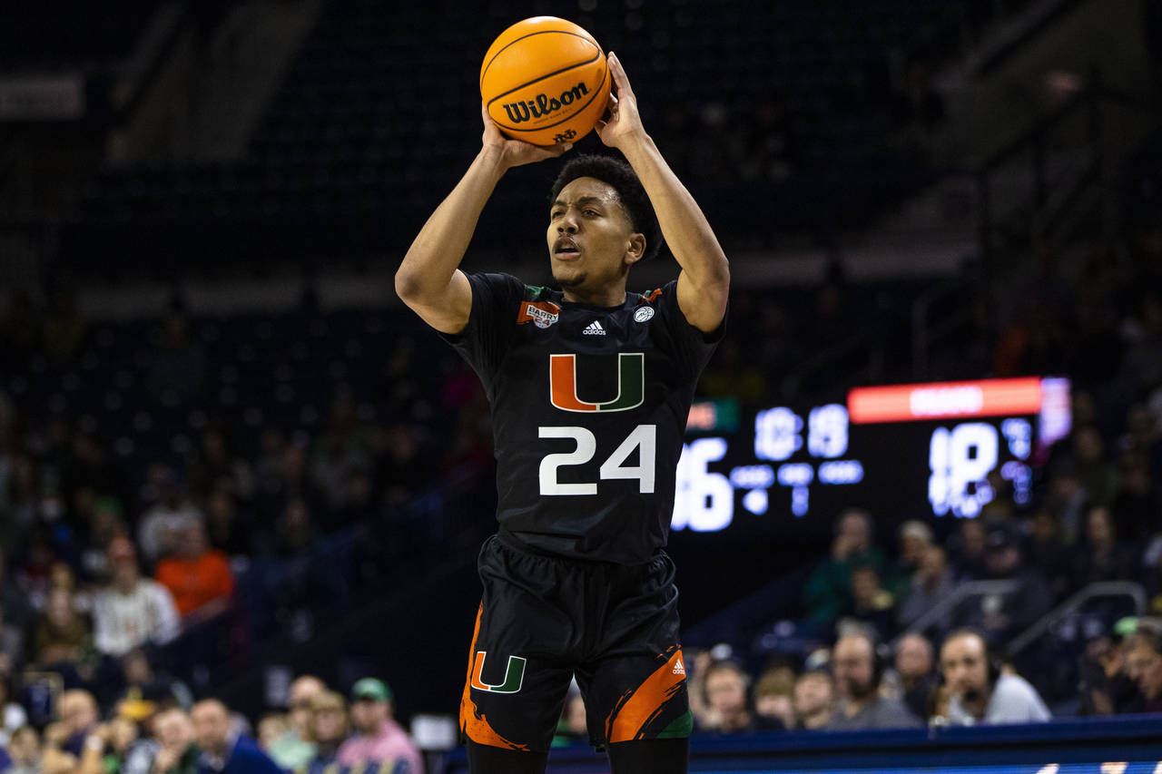 Miami's Nijel Pack (24) shoots during the first half of an NCAA college basketball game against Not...