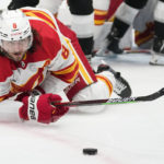 Kempe strikes in OT, Kings top Flames after giving away lead