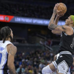 Magic beat Spurs 133-113 for 8th victory in 9 games