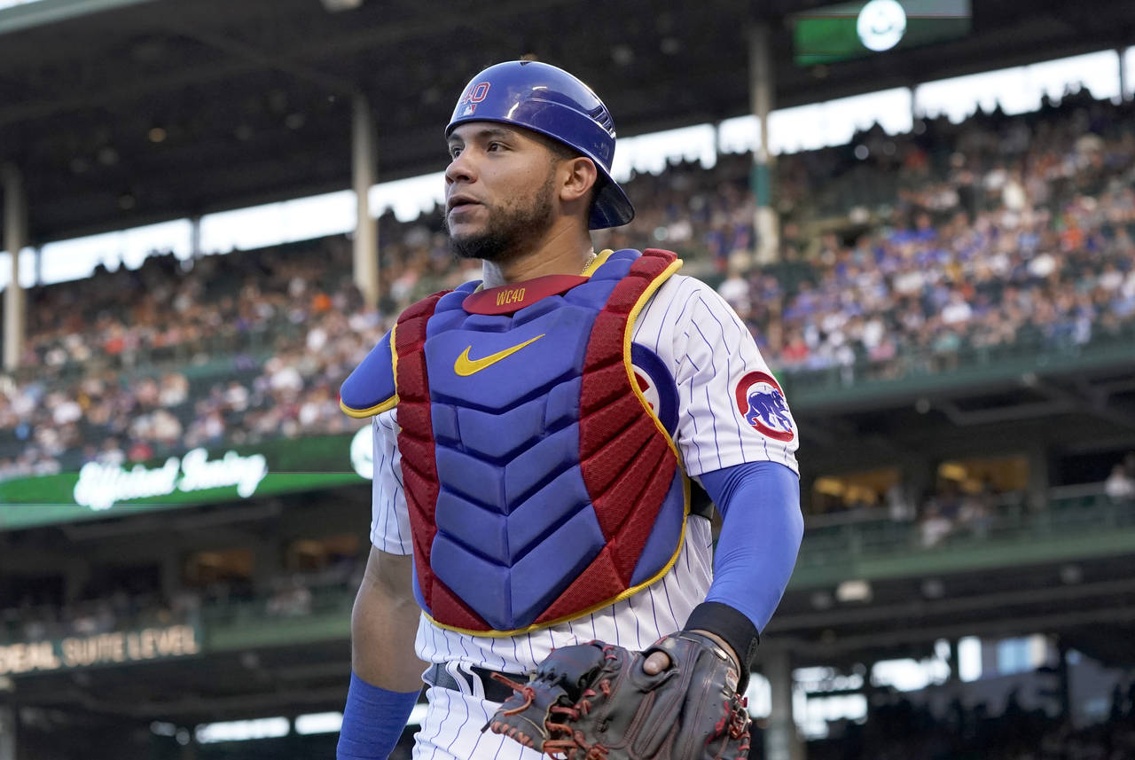 FILE - Chicago Cubs catcher Willson Contreras heads back to the dugout during the team's baseball g...