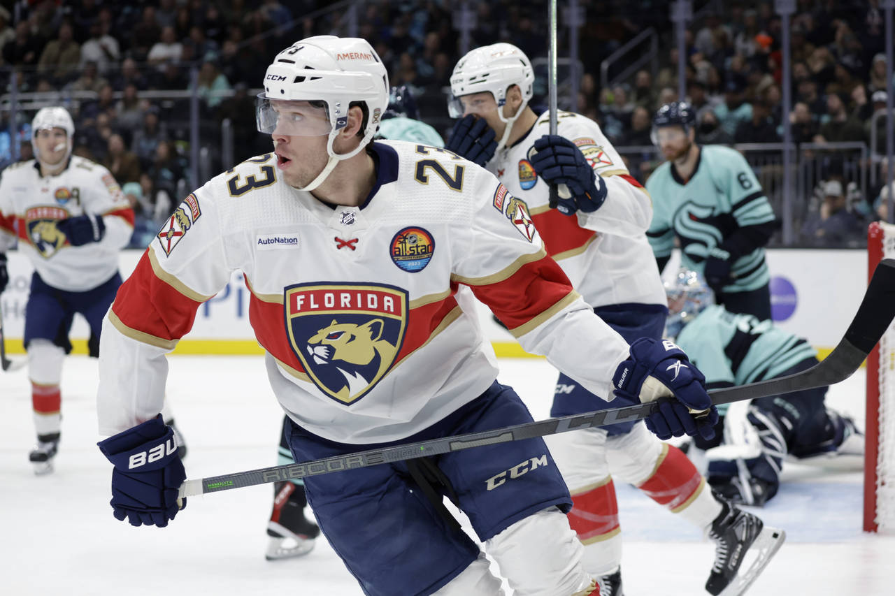 Florida Panthers center Carter Verhaeghe (23) skates from the goal after scoring his second goal of...
